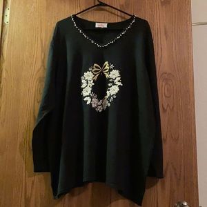 Black top with silver and gold colored design